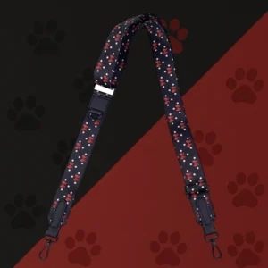 Bandoulière sacoche Woofty noir à pois et nœuds rouges, réglable, mousquetons métal noir.