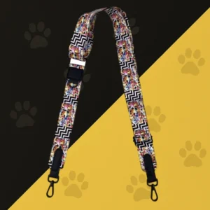 Bandoulière sacoche Woofty chevron noir/blanc avec smileys, réglable, mousquetons métal.